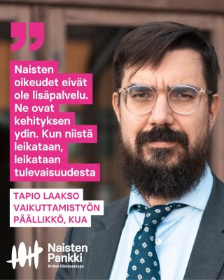 mies katsoo kameraan vakavana