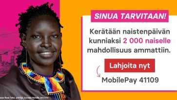 Nainen värikkäässä mekossa.