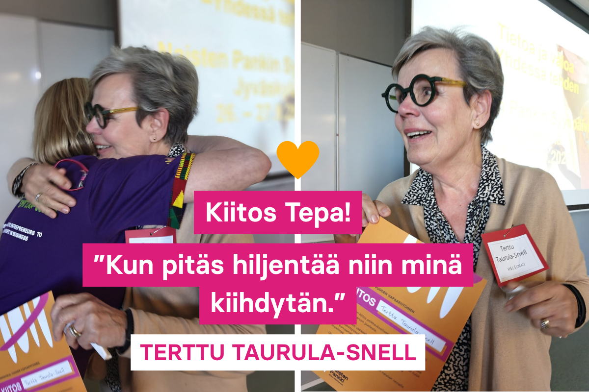 Kaksi naista halaamassa toisiaan.